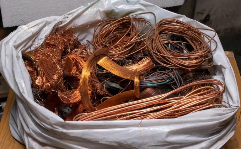 Copper scrap in a plastic bag ready for recycling